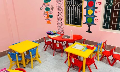 Classroom with colorful tables and chairs